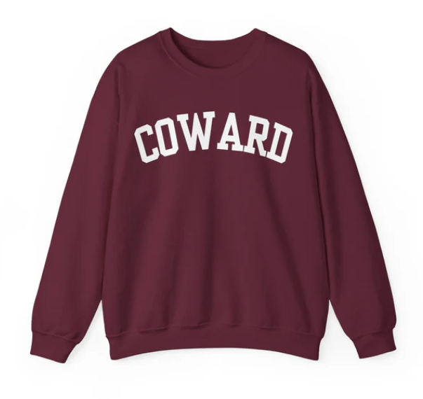 sweatshirt that says "COWARD"